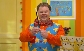 Mr Tumble Conducts A Concert